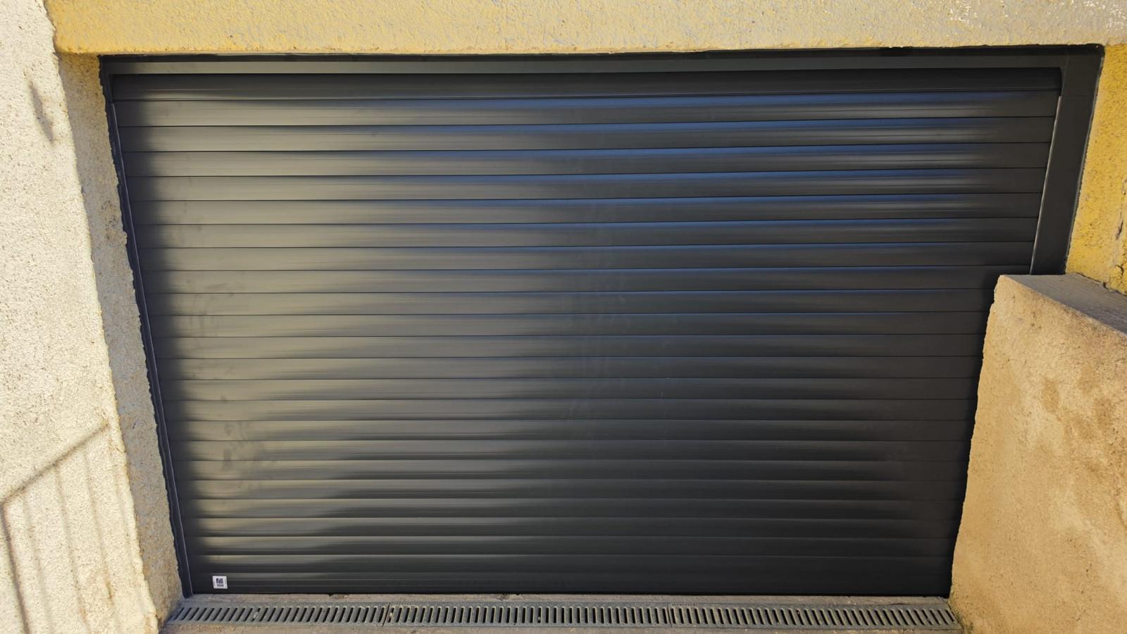 Pose d une porte de garage